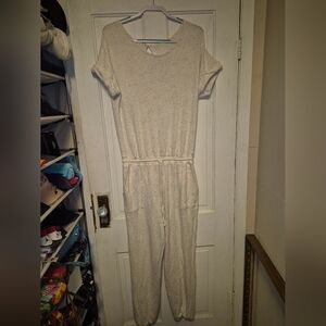 Cherish brand lounge jumpsuit in white with multicolor spots.